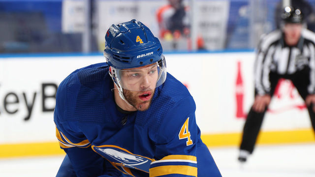 BUFFALO, NY - MARCH 29: Taylor Hall #4 of the Buffalo Sabres prepares for a faceoff during an NHL game against the Philadelphia Flyers on March 29, 2021 at KeyBank Center in Buffalo, New York.