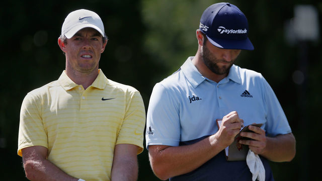 ATLANTA, GA - AUGUST 22: Rory McIlroy (L) and Jon Rahm prepare to tee off during the first round of the TOUR Championship, at East Lake Golf Club on August 22, 2019 in Atlanta, GA.