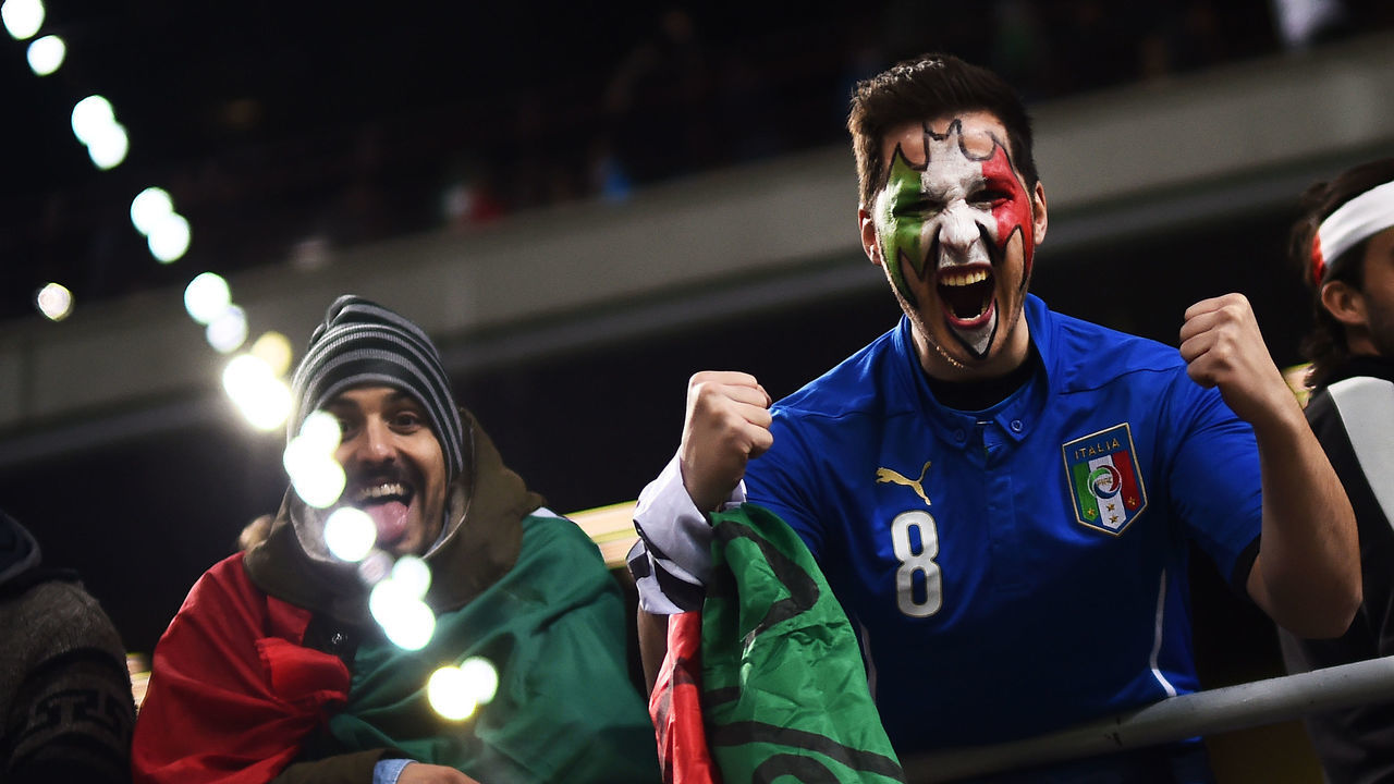 Italy's supporters pose prior the FIFA World Cup 2018 qualification football match between Italy and Sweden, on November 13, 2017 at the San Siro stadium in Milan. / AFP PHOTO / Marco BERTORELLO