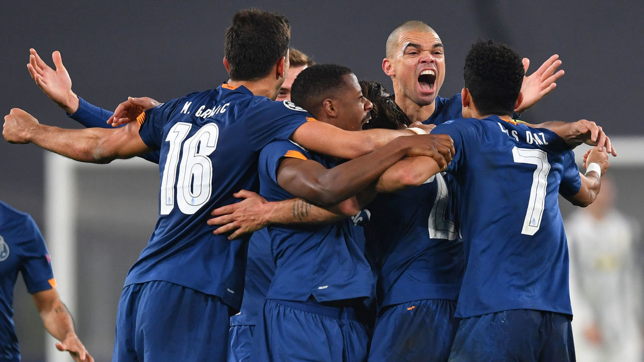 TURIN, ITALY - MARCH 09: Sergio Oliveira of Porto celebrates with team mates after scoring their side's second goal during the UEFA Champions League Round of 16 match between Juventus and FC Porto at Juventus Arena on March 09, 2021 in Turin, Italy. Sporting stadiums around Italy remain under strict restrictions due to the Coronavirus Pandemic as Government social distancing laws prohibit fans inside venues resulting in games being played behind closed doors.