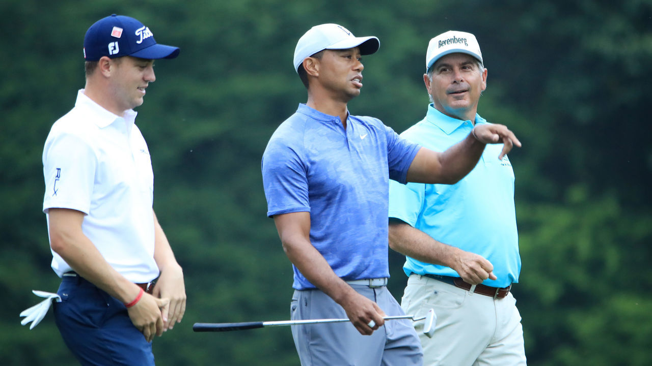 AUGUSTA, GEORGIA - APRIL 08: Justin Thomas of the United States, Tiger Woods of the United States and Fred Couples of the United States walk on the 12th hole during a practice round prior to The Masters at Augusta National Golf Club on April 08, 2019 in Augusta, Georgia.