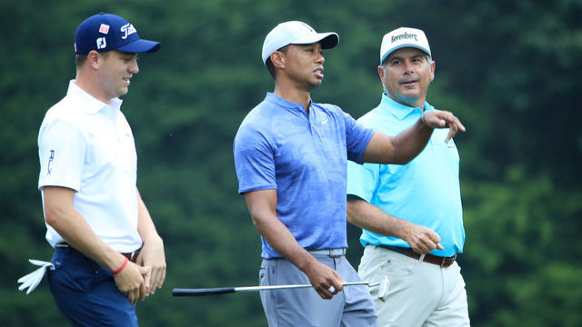 AUGUSTA, GEORGIA - APRIL 08: Justin Thomas of the United States, Tiger Woods of the United States and Fred Couples of the United States walk on the 12th hole during a practice round prior to The Masters at Augusta National Golf Club on April 08, 2019 in Augusta, Georgia.