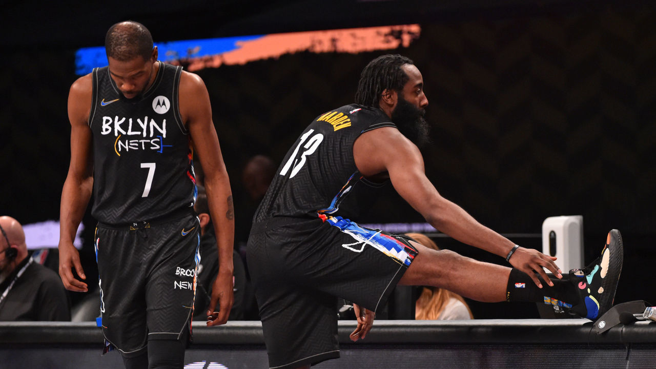 BROOKLYN, NY - FEBRUARY 2: Kevin Durant #7 of the Brooklyn Nets and James Harden #13 of the Brooklyn Nets stretch during a game against the LA Clippers on February 2, 2021 at Barclays Center in Brooklyn, New York. NOTE TO USER: User expressly acknowledges and agrees that, by downloading and/or using this Photograph, user is consenting to the terms and conditions of the Getty Images License Agreement. Mandatory Copyright Notice: Copyright 2021 NBAE