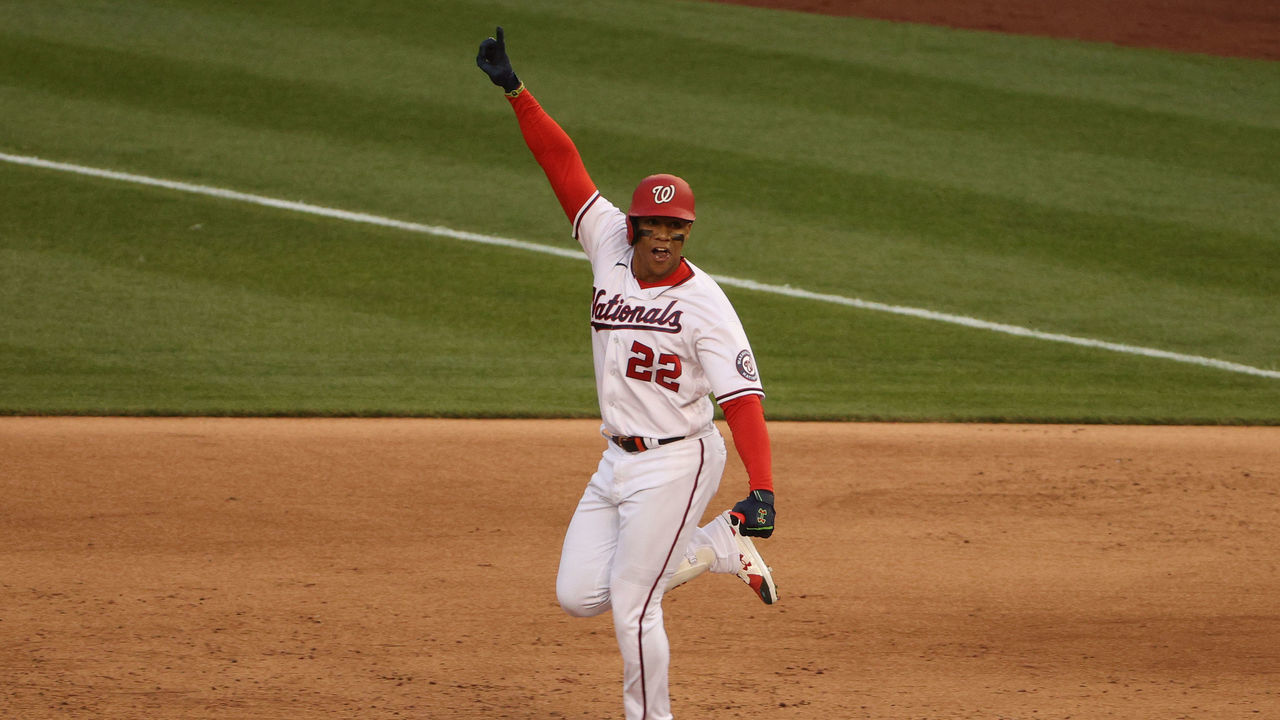 WASHINGTON, DC - APRIL 06: Juan Soto #22 of the Washington Nationals celebrates his walk-off single against the Atlanta Braves during the ninth inning at Nationals Park on April 6, 2021 in Washington, DC. The Washington Nationals won their 2021 Opening Day game, 6-5.