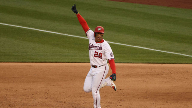WASHINGTON, DC - APRIL 06: Juan Soto #22 of the Washington Nationals celebrates his walk-off single against the Atlanta Braves during the ninth inning at Nationals Park on April 6, 2021 in Washington, DC. The Washington Nationals won their 2021 Opening Day game, 6-5.