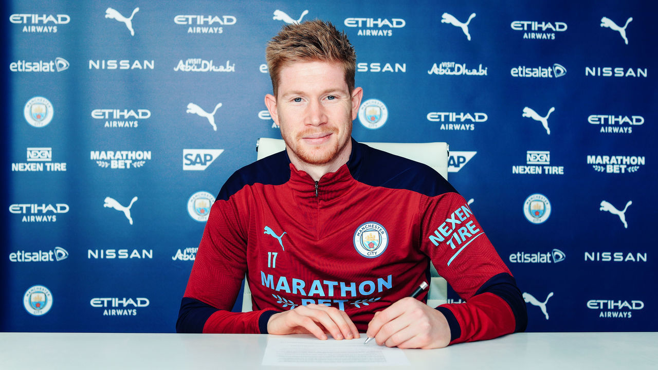 MANCHESTER, ENGLAND - APRIL 07: Kevin de Bruyne of Manchester City signs a new contract extension at the club at Manchester City Football Academy on April 07, 2021 in Manchester, England.