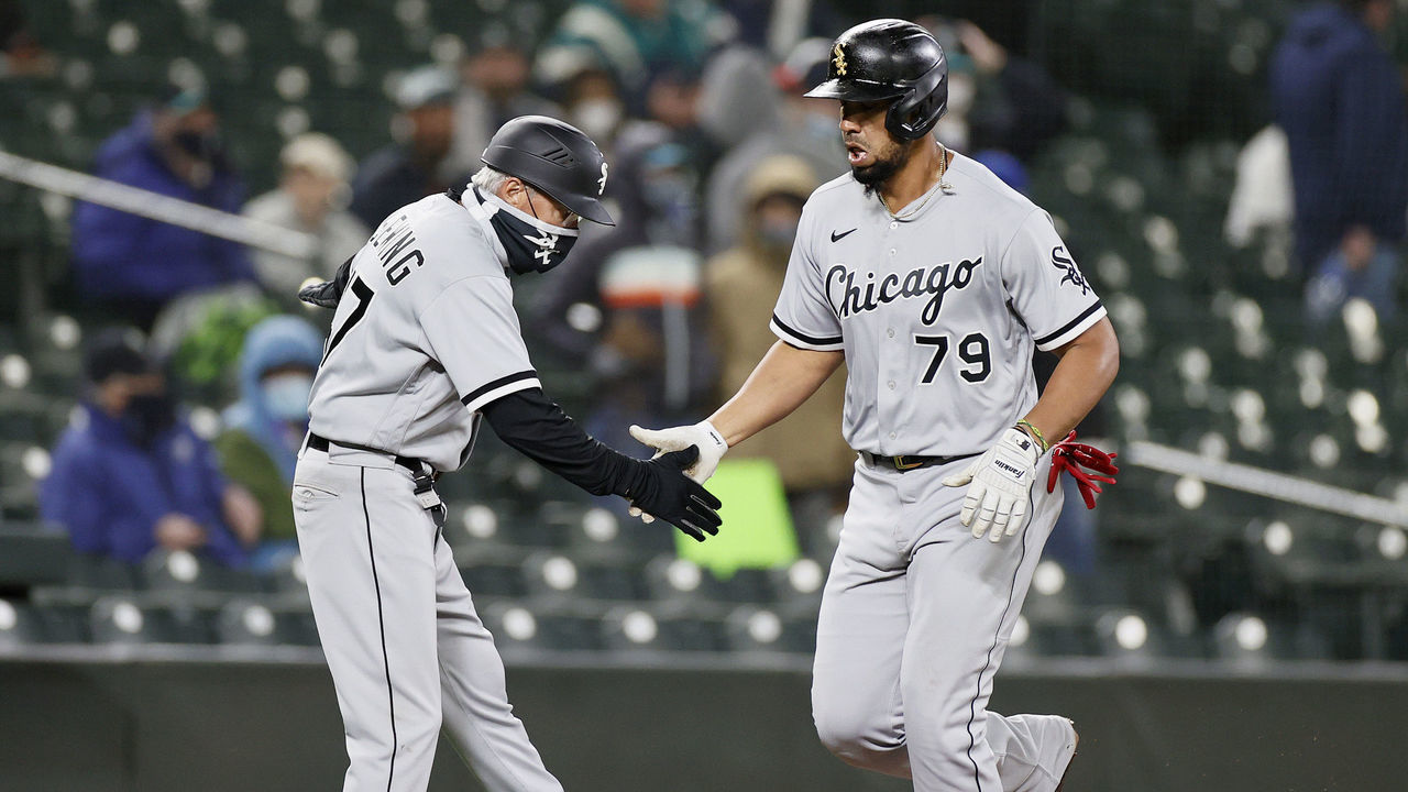 SEATTLE, WASHINGTON - APRIL 06: Jose Abreu #79 of the Chicago White Sox celebrates his grand slam home run against the Seattle Mariners in the eighth inning at T-Mobile Park on April 06, 2021 in Seattle, Washington.