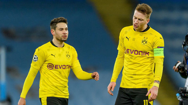 MANCHESTER, ENGLAND - APRIL 06: (BILD ZEITUNG OUT) Raphael Guerreiro of Borussia Dortmund and Marco Reus of Borussia Dortmund looks dejected during the UEFA Champions League Quarter Final match between Manchester City and Borussia Dortmund at Manchester City Football Academy on April 6, 2021 in Manchester, United Kingdom. Sporting stadiums around the UK remain under strict restrictions due to the Coronavirus Pandemic as Government social distancing laws prohibit fans inside venues resulting in games being played behind closed doors.