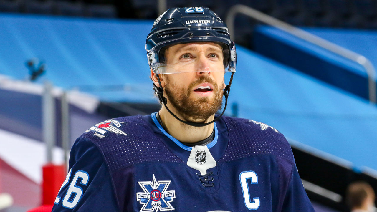 WINNIPEG, MB - MARCH 15: Blake Wheeler #26 of the Winnipeg Jets looks on during a third period stoppage in play against the Montreal Canadiens at the Bell MTS Place on March 15, 2021 in Winnipeg, Manitoba, Canada.
