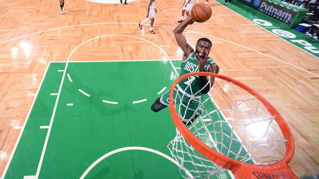 BOSTON, MA - APRIL 7: Jaylen Brown #7 of the Boston Celtics dunks the ball during the game against the New York Knicks on April 7, 2021 at the TD Garden in Boston, Massachusetts. Mandatory Copyright Notice: Copyright 2021 NBAE