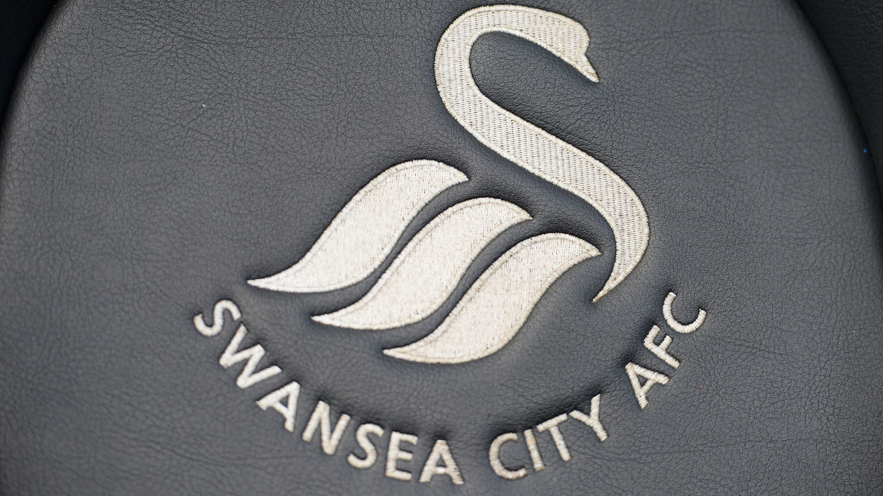 SWANSEA, WALES - MARCH 05: A Swansea City club crest is seen prior to the Barclays Premier League match between Swansea City and Norwich City at Liberty Stadium on March 5, 2016 in Swansea, Wales.