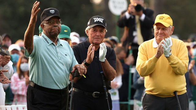 AUGUSTA, GEORGIA - APRIL 08: Honorary Starter Lee Elder of the United States (L), waves to the patrons as he is introduced and honorary starter and Masters champion Gary Player of South Africa and honorary starter and Masters champion Jack Nicklaus applaud from the first tee during the opening ceremony prior to the start of the first round of the Masters at Augusta National Golf Club on April 08, 2021 in Augusta, Georgia.