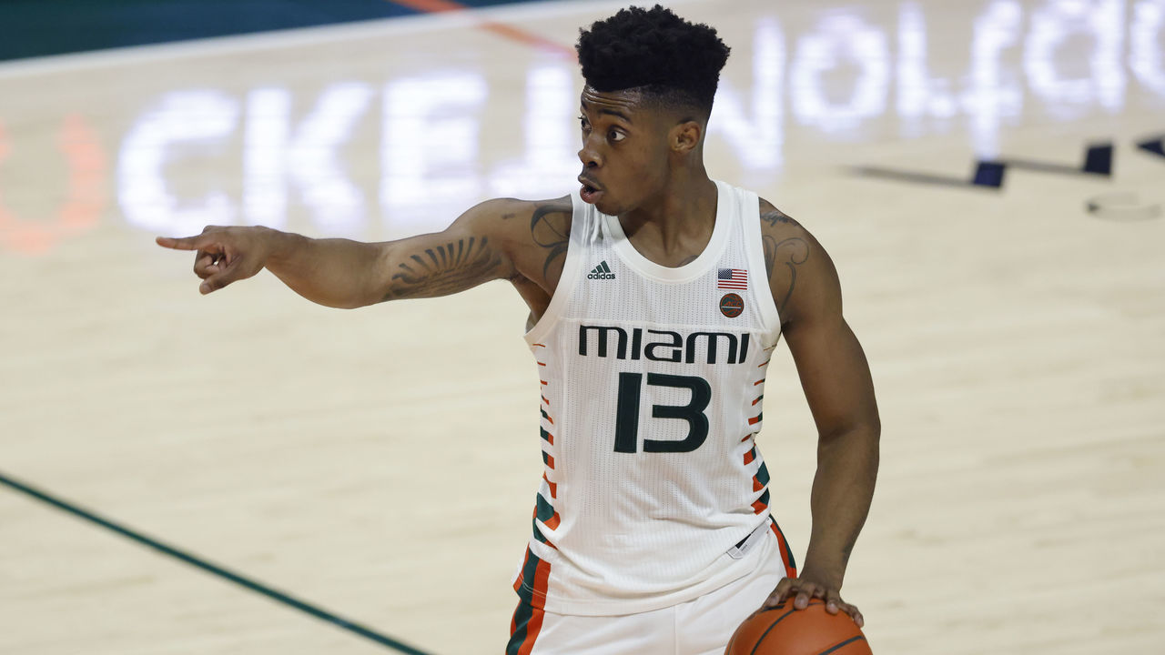 MIAMI, FLORIDA - JANUARY 05: Earl Timberlake #13 of the Miami Hurricanes reacts against the North Carolina Tar Heels during the second half at Watsco Center on January 05, 2021 in Miami, Florida.