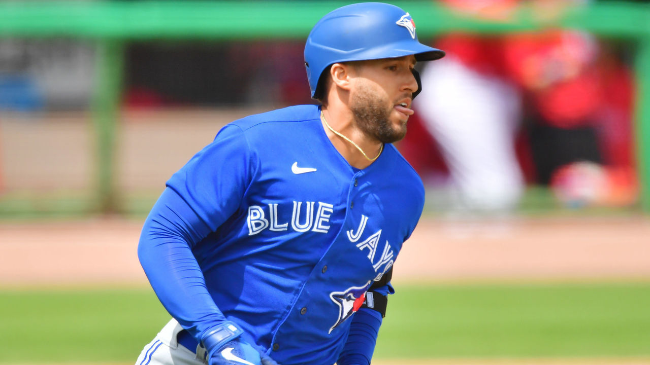 CLEARWATER, FLORIDA - MARCH 20: George Springer #4 of the Toronto Blue Jays runs to first after hitting a single off of Matt Moore of the Philadelphia Phillies in the first inning of a spring training game on March 20, 2021 at BayCare Ballpark in Clearwater, Florida.