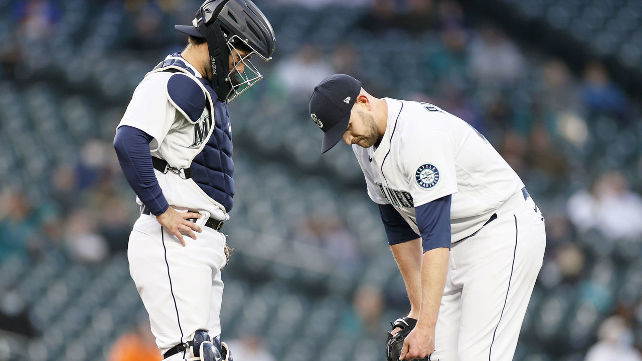 SEATTLE, WASHINGTON - APRIL 06: James Paxton #44 of the Seattle Mariners pauses for an injury in the second inning against the Chicago White Sox at T-Mobile Park on April 06, 2021 in Seattle, Washington.