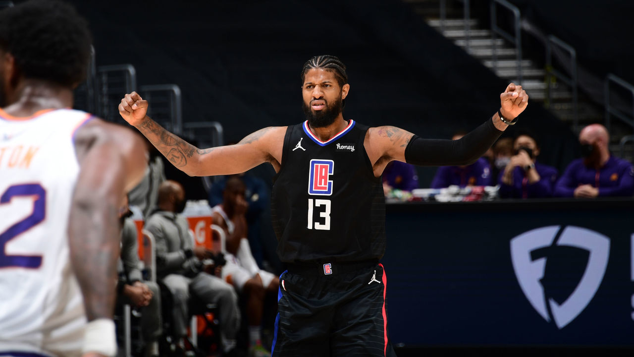 LOS ANGELES, CA - APRIL 8: Paul George #13 of the LA Clippers celebrates during the game against the Phoenix Suns on April 8, 2021 at STAPLES Center in Los Angeles, California. NOTE TO USER: User expressly acknowledges and agrees that, by downloading and/or using this Photograph, user is consenting to the terms and conditions of the Getty Images License Agreement. Mandatory Copyright Notice: Copyright 2021 NBAE