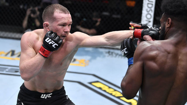 LAS VEGAS, NEVADA - MARCH 06: In this handout image provided by UFC, (L-R) Petr Yan of Russia punches Aljamain Sterling in their UFC bantamweight championship fight during the UFC 259 event at UFC APEX on March 06, 2021 in Las Vegas, Nevada.