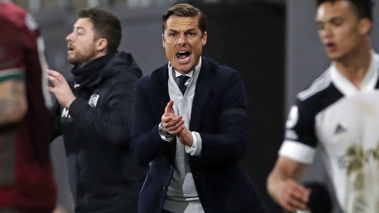 Fulham's English manager Scott Parker gestures on the touchline during the English Premier League football match between Fulham and Wolverhampton Wanderers at Craven Cottage in London on April 9, 2021. - RESTRICTED TO EDITORIAL USE. No use with unauthorized audio, video, data, fixture lists, club/league logos or 'live' services. Online in-match use limited to 120 images. An additional 40 images may be used in extra time. No video emulation. Social media in-match use limited to 120 images. An additional 40 images may be used in extra time. No use in betting publications, games or single club/league/player publications.