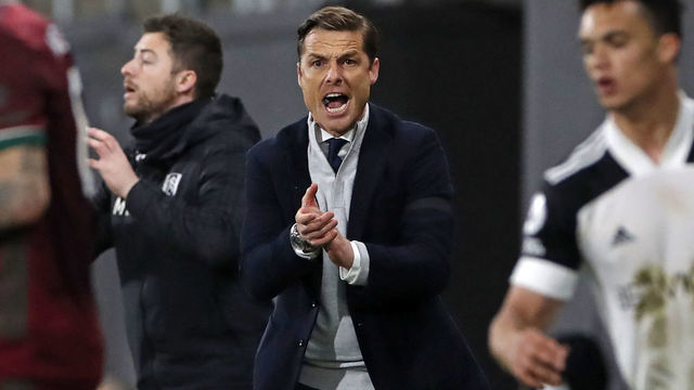 Fulham's English manager Scott Parker gestures on the touchline during the English Premier League football match between Fulham and Wolverhampton Wanderers at Craven Cottage in London on April 9, 2021. - RESTRICTED TO EDITORIAL USE. No use with unauthorized audio, video, data, fixture lists, club/league logos or 'live' services. Online in-match use limited to 120 images. An additional 40 images may be used in extra time. No video emulation. Social media in-match use limited to 120 images. An additional 40 images may be used in extra time. No use in betting publications, games or single club/league/player publications.