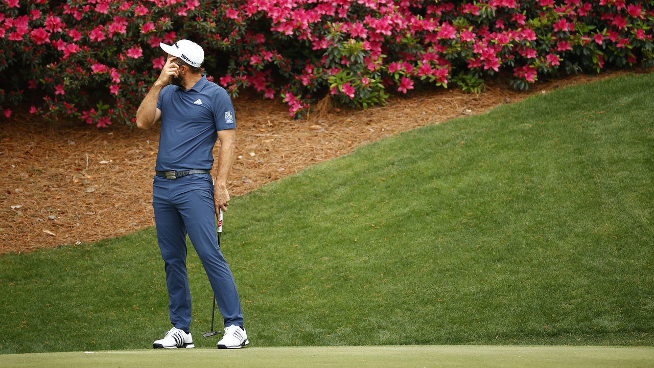 AUGUSTA, GEORGIA - APRIL 09: Dustin Johnson of the United States reacts on the 13th green during the second round of the Masters at Augusta National Golf Club on April 09, 2021 in Augusta, Georgia.
