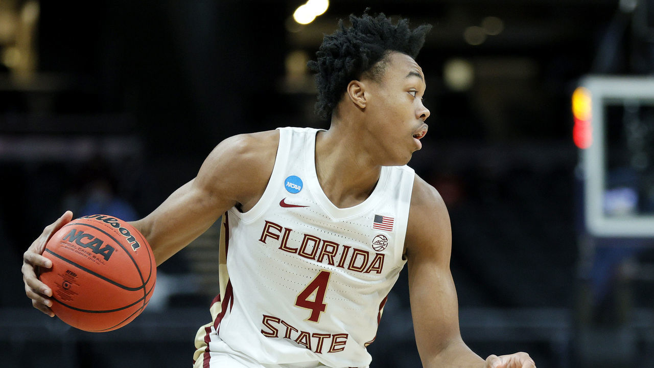 INDIANAPOLIS, INDIANA - MARCH 20: Scottie Barnes #4 of the Florida State Seminoles handles the ball during the first half against the UNC-Greensboro Spartans in the first round game of the 2021 NCAA Men's Basketball Tournament at Bankers Life Fieldhouse on March 20, 2021 in Indianapolis, Indiana.
