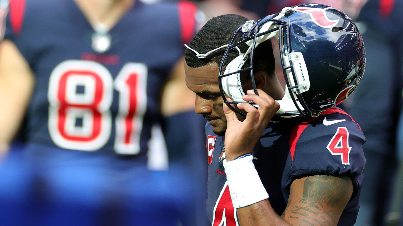 HOUSTON, TEXAS - DECEMBER 27: Quarterback Deshaun Watson #4 of the Houston Texans walks off the field after a fumble in the fourth quarter of the game against the Cincinnati Bengals at NRG Stadium on December 27, 2020 in Houston, Texas.
