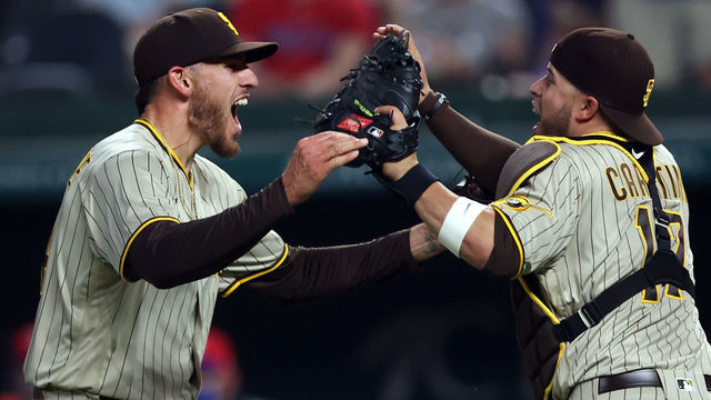 ARLINGTON, TEXAS - APRIL 09: Joe Musgrove #44 of the San Diego Padres celebrates with Victor Caratini #17 after pitching a no-hitter against the Texas Rangers at Globe Life Field on April 09, 2021 in Arlington, Texas. This was the Padres first no-hitter in franchise history.