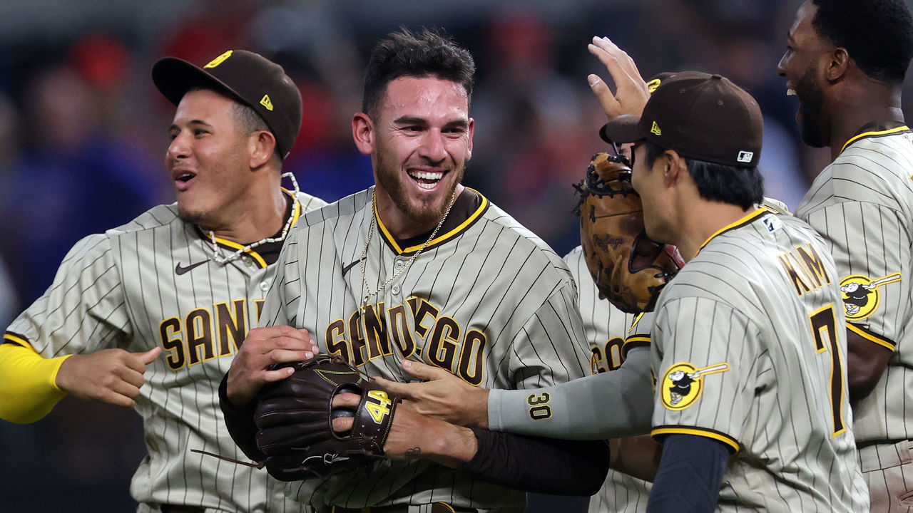 ARLINGTON, TEXAS - APRIL 09: Joe Musgrove #44 of the San Diego Padres celebrates with his team after pitching a no-hitter against the Texas Rangers at Globe Life Field on April 09, 2021 in Arlington, Texas. This was the Padres first no-hitter in franchise history.