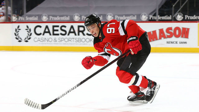 NEWARK, NEW JERSEY - MARCH 14: Nikita Gusev #97 of the New Jersey Devils in action against the New York Islanders at Prudential Center on March 14, 2021 in Newark, New Jersey. New York Islanders defeated the New York Islanders 3-2 in a SO.