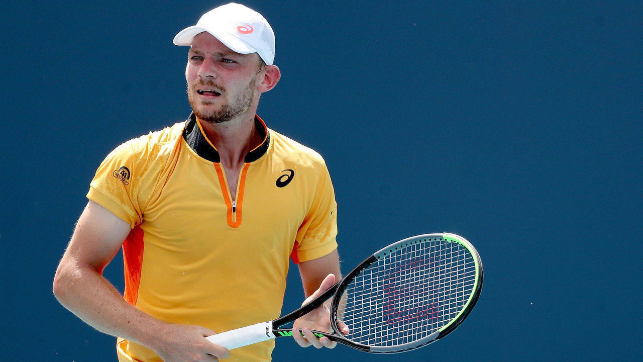 MIAMI GARDENS, FLORIDA - MARCH 26: David Goffin of Belgium plays James Duckworth of Australia during the Miami Open at Hard Rock Stadium on March 26, 2021 in Miami Gardens, Florida.