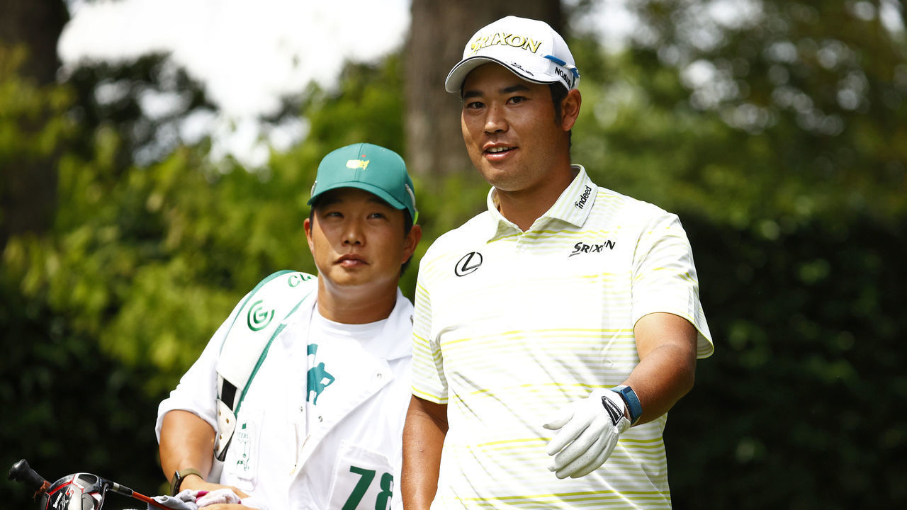AUGUSTA, GEORGIA - APRIL 11: Hideki Matsuyama of Japan talks with his caddie Shota Hayafuji on the second tee during the final round of the Masters at Augusta National Golf Club on April 11, 2021 in Augusta, Georgia.