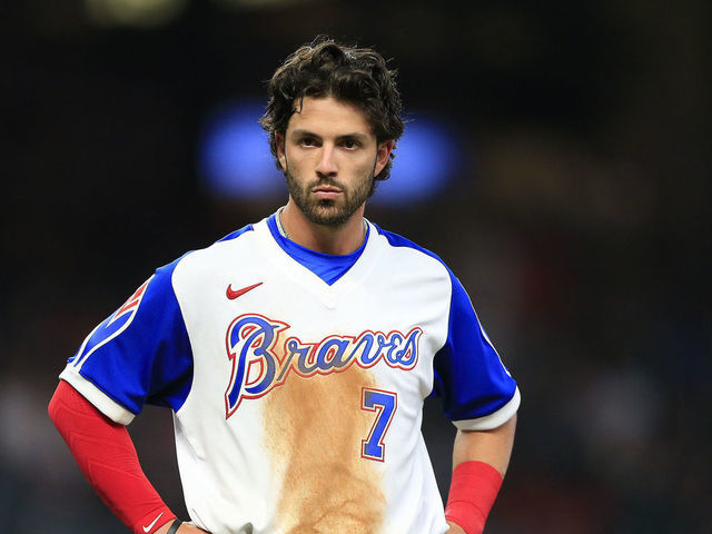 ATLANTA, GA - APRIL 09: Dansby Swanson #7 of the Atlanta Braves looks on during the Atlanta Braves 2021 season home opener against the Philadelphia Phillies on April 09, 2021 at Truist Park in Atlanta, Georgia.