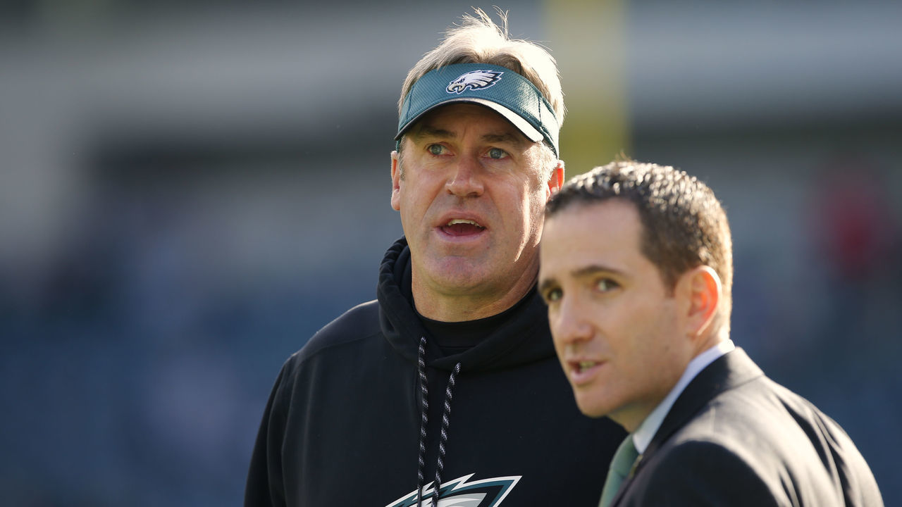 PHILADELPHIA, PA - JANUARY 01: Head coach Doug Pederson of the Philadelphia Eagles talks with general manager Howie Roseman before a game against the Dallas Cowboys at Lincoln Financial Field on January 1, 2017 in Philadelphia, Pennsylvania.