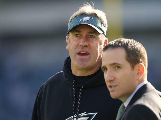 PHILADELPHIA, PA - JANUARY 01: Head coach Doug Pederson of the Philadelphia Eagles talks with general manager Howie Roseman before a game against the Dallas Cowboys at Lincoln Financial Field on January 1, 2017 in Philadelphia, Pennsylvania.