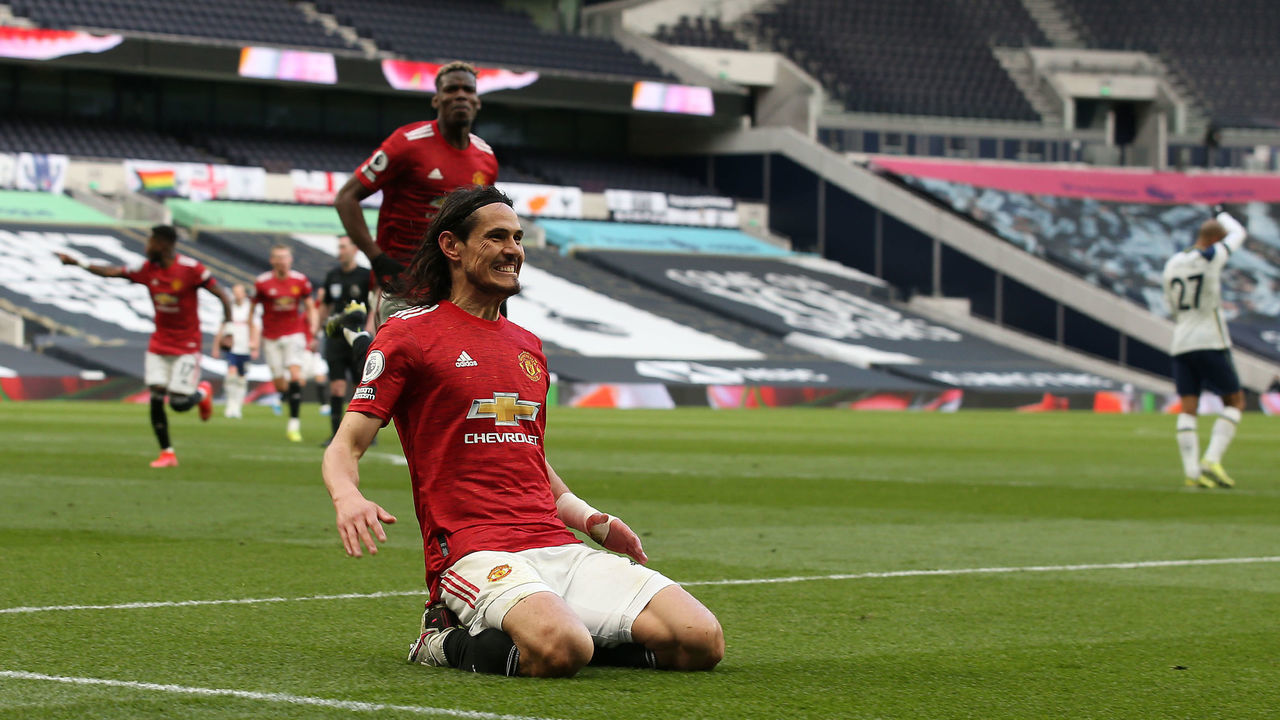 LONDON, ENGLAND - APRIL 11: Edinson Cavani of Manchester United celebrates scoring their second goal during the Premier League match between Tottenham Hotspur and Manchester United at Tottenham Hotspur Stadium on April 11, 2021 in London, England. Sporting stadiums around the UK remain under strict restrictions due to the Coronavirus Pandemic as Government social distancing laws prohibit fans inside venues resulting in games being played behind closed doors.