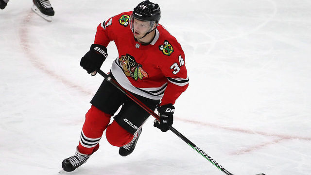 CHICAGO, ILLINOIS - JANUARY 24: Carl Soderberg #34 of the Chicago Blackhawks skates against the Detroit Red Wings at the United Center on January 24, 2021 in Chicago, Illinois.