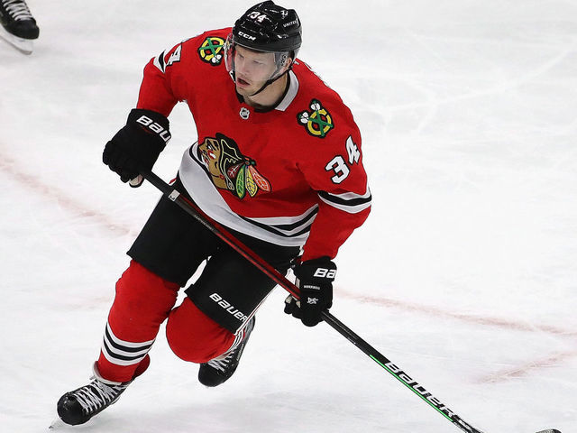 CHICAGO, ILLINOIS - JANUARY 24: Carl Soderberg #34 of the Chicago Blackhawks skates against the Detroit Red Wings at the United Center on January 24, 2021 in Chicago, Illinois.