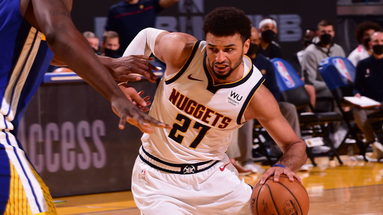 SAN FRANCISCO, CA - APRIL 12: Jamal Murray #27 of the Denver Nuggets drives to the basket during the game against the Golden State Warriors on April 12, 2021 at Chase Center in San Francisco, California. NOTE TO USER: User expressly acknowledges and agrees that, by downloading and or using this photograph, user is consenting to the terms and conditions of Getty Images License Agreement. Mandatory Copyright Notice: Copyright 2021 NBAE