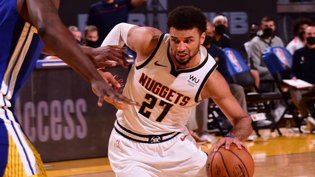 SAN FRANCISCO, CA - APRIL 12: Jamal Murray #27 of the Denver Nuggets drives to the basket during the game against the Golden State Warriors on April 12, 2021 at Chase Center in San Francisco, California. NOTE TO USER: User expressly acknowledges and agrees that, by downloading and or using this photograph, user is consenting to the terms and conditions of Getty Images License Agreement. Mandatory Copyright Notice: Copyright 2021 NBAE
