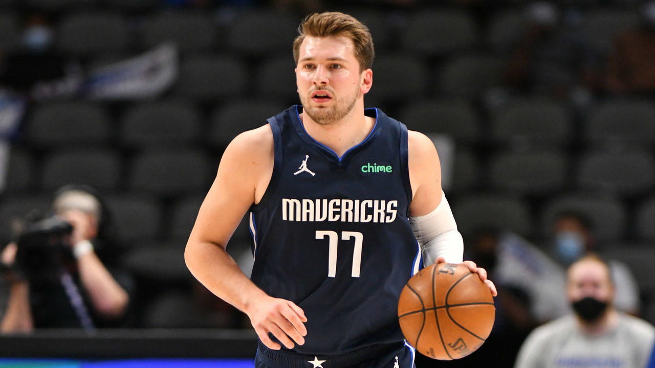 DALLAS, TX - APRIL 12: Luka Doncic #77 of the Dallas Mavericks dribbles against the Philadelphia 76ers on April 12, 2021 at the American Airlines Center in Dallas, Texas. Mandatory Copyright Notice: Copyright 2021 NBAE