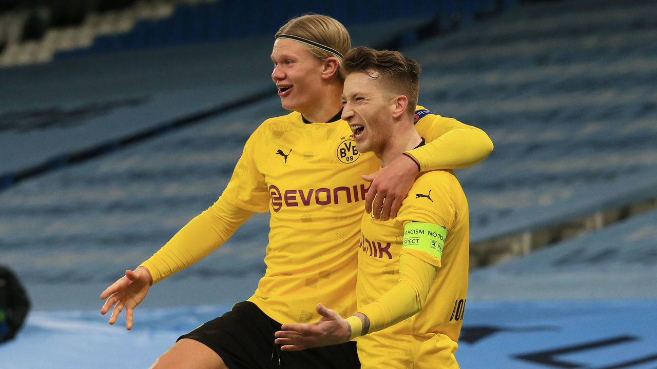 06 April 2021, United Kingdom, Manchester: Football: Champions League, Manchester City - Borussia Dortmund, knockout round, quarter-finals, first leg at Etihad Stadium. Dortmund's Marco Reus (r) celebrates his goal to make it 1:1 with Erling Haaland. Photo: Lindsey Parnaby/dpa