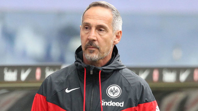 Frankfurt's Austrian head coach Adi Huetter looks on ahead the German first division Bundesliga football match between Eintracht Frankfurt and VfL Wolfsburg in Frankfurt, western Germany, on April 10, 2021. - DFL REGULATIONS PROHIBIT ANY USE OF PHOTOGRAPHS AS IMAGE SEQUENCES AND/OR QUASI-VIDEO