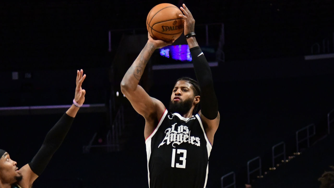 LOS ANGELES, CA - MARCH 20: Paul George #13 of the LA Clippers shoots the ball against the Charlotte Hornets on MARCH 20, 2021 at STAPLES Center in Los Angeles, California. NOTE TO USER: User expressly acknowledges and agrees that, by downloading and/or using this Photograph, user is consenting to the terms and conditions of the Getty Images License Agreement. Mandatory Copyright Notice: Copyright 2021 NBAE