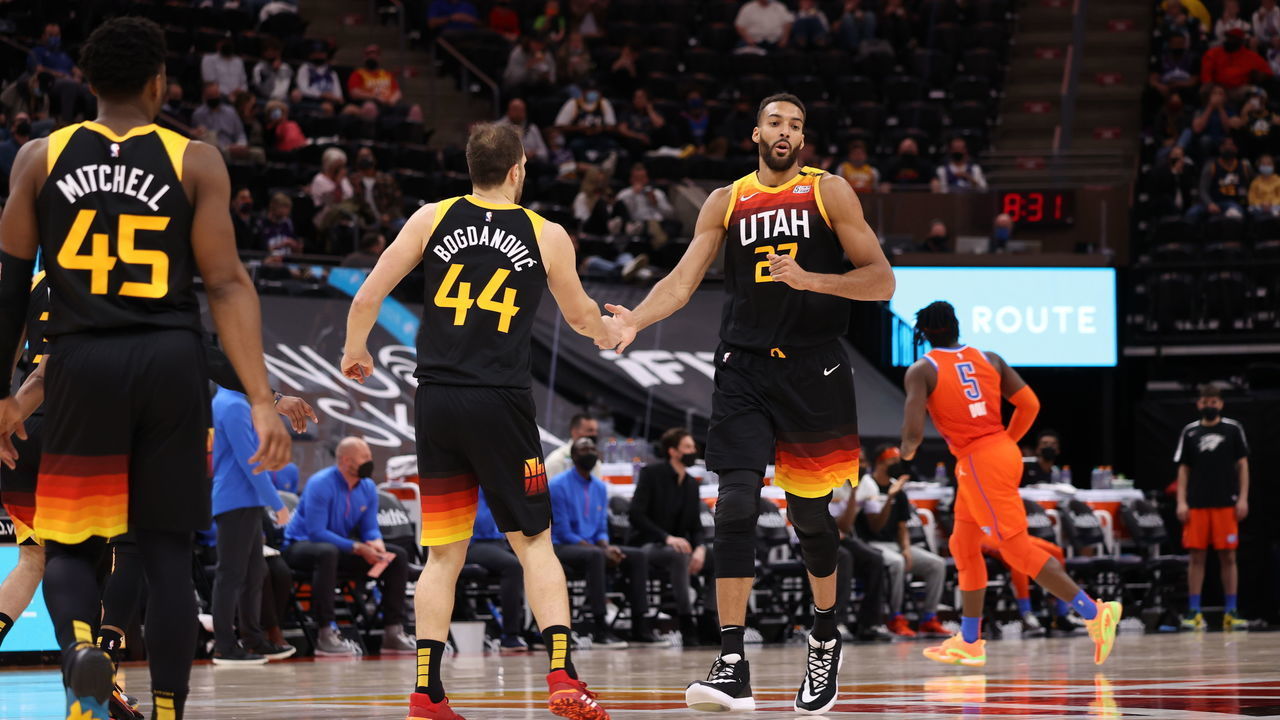 SALT LAKE CITY, UT - APRIL 13: Bojan Bogdanovic #44 and Rudy Gobert #27 of the Utah Jazz hi-five during the game against the Oklahoma City Thunder on April 13, 2021 at vivint.SmartHome Arena in Salt Lake City, Utah. Mandatory Copyright Notice: Copyright 2021 NBAE