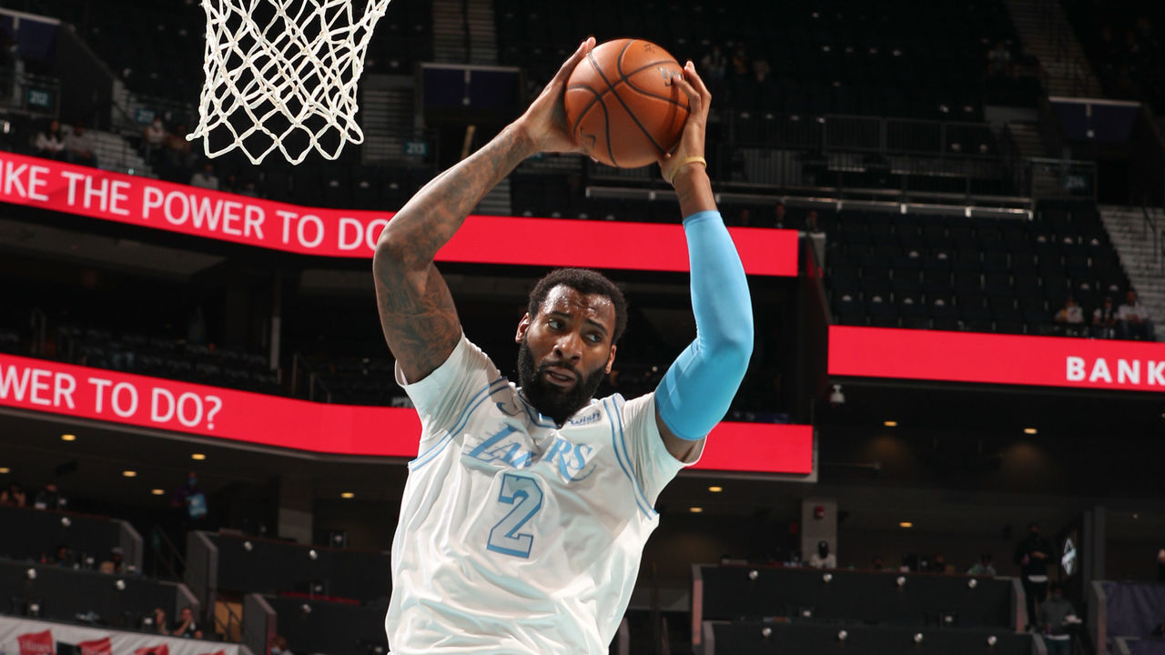 CHARLOTTE, NC - APRIL 13: Andre Drummond #2 of the Los Angeles Lakers rebounds the ball during the game against the Charlotte Hornets on April 13, 2021 at Spectrum Center in Charlotte, North Carolina. Mandatory Copyright Notice: Copyright 2021 NBAE