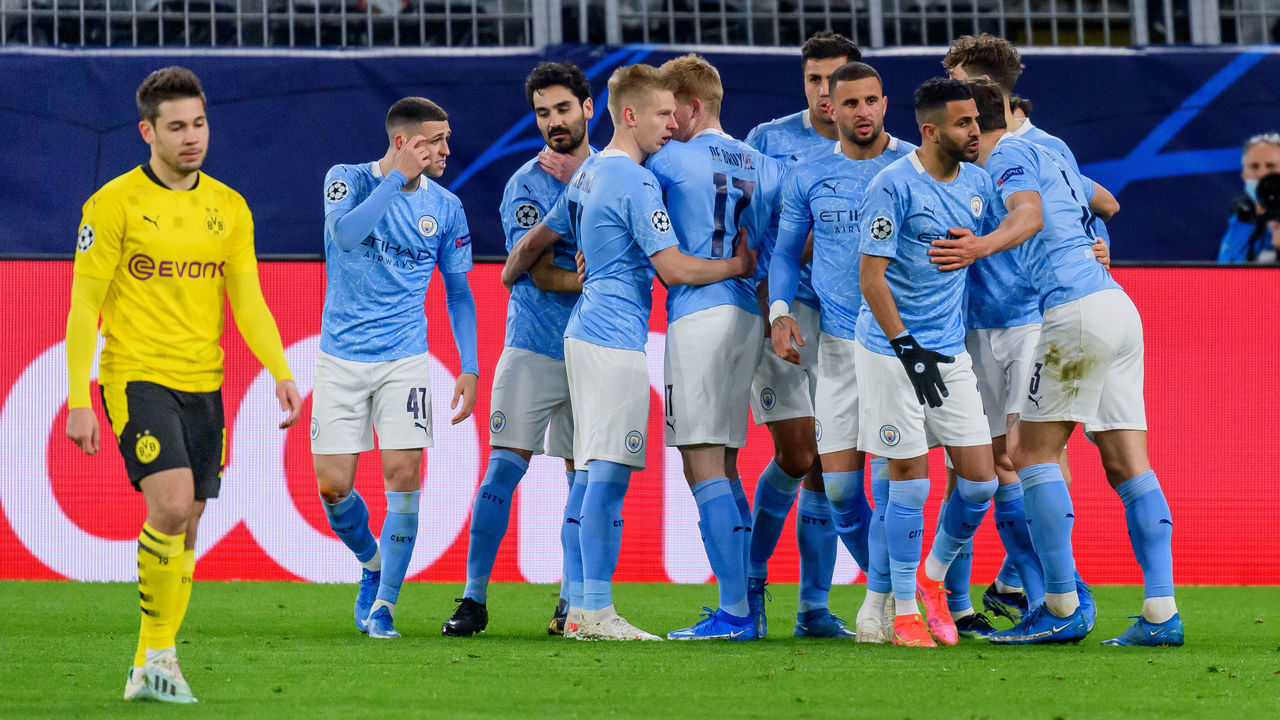DORTMUND, GERMANY - APRIL 14:(BILD ZEITUNG OUT) Riyad Mahrez of Manchester City celebrates after scoring his team's second goal with teammates during the UEFA Champions League Quarter Final Second Leg match between Borussia Dortmund and Manchester City at Signal Iduna Park on April 14, 2021 in Dortmund, Germany.