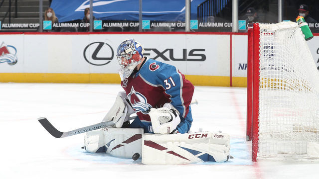 DENVER, COLORADO - MARCH 10: Goaltender Philipp Grubauer #31 of the Colorado Avalanche makes save against the Arizona Coyotes at Ball Arena on March 10, 2021 in Denver, Colorado. The Avalanche defeated the Coyotes 2-1 in overtime.