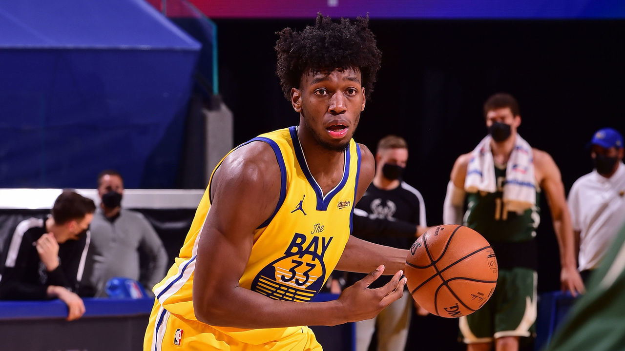 SAN FRANCISCO, CA - APRIL 6: James Wiseman #33 of the Golden State Warriors dribbles the ball against the Milwaukee Bucks on April 6, 2021 at Chase Center in San Francisco, California. NOTE TO USER: User expressly acknowledges and agrees that, by downloading and or using this photograph, user is consenting to the terms and conditions of Getty Images License Agreement. Mandatory Copyright Notice: Copyright 2021 NBAE