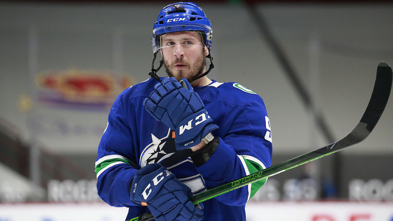 VANCOUVER, BC - MARCH 22: J.T. Miller #9 of the Vancouver Canucks skates up ice during their NHL game against the Winnipeg Jets at Rogers Arena on March 22, 2021 in Vancouver, British Columbia, Canada. "n