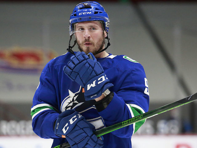 VANCOUVER, BC - MARCH 22: J.T. Miller #9 of the Vancouver Canucks skates up ice during their NHL game against the Winnipeg Jets at Rogers Arena on March 22, 2021 in Vancouver, British Columbia, Canada. "n